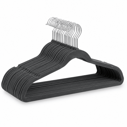 Charcoal grey velvet non-slip clothes hangers with chrome hooks displayed on a white background