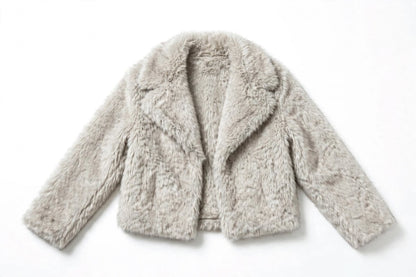 Flat lay front view of a light grey cropped faux fur jacket with notched lapels.