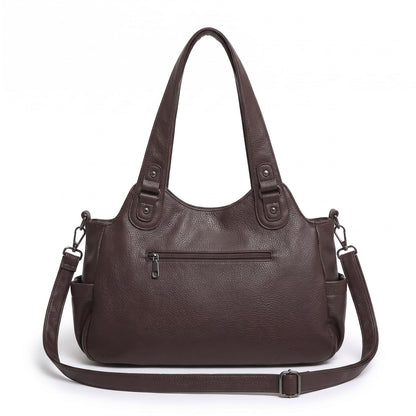 Back view of the dark brown faux leather hobo bag with an exterior zip pocket and attached shoulder strap, on a white background.