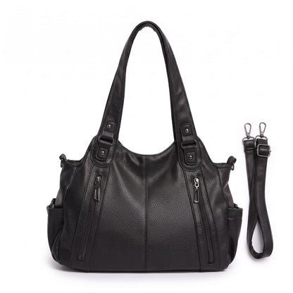 Front view of a black faux leather shoulder bag with an adjustable strap.