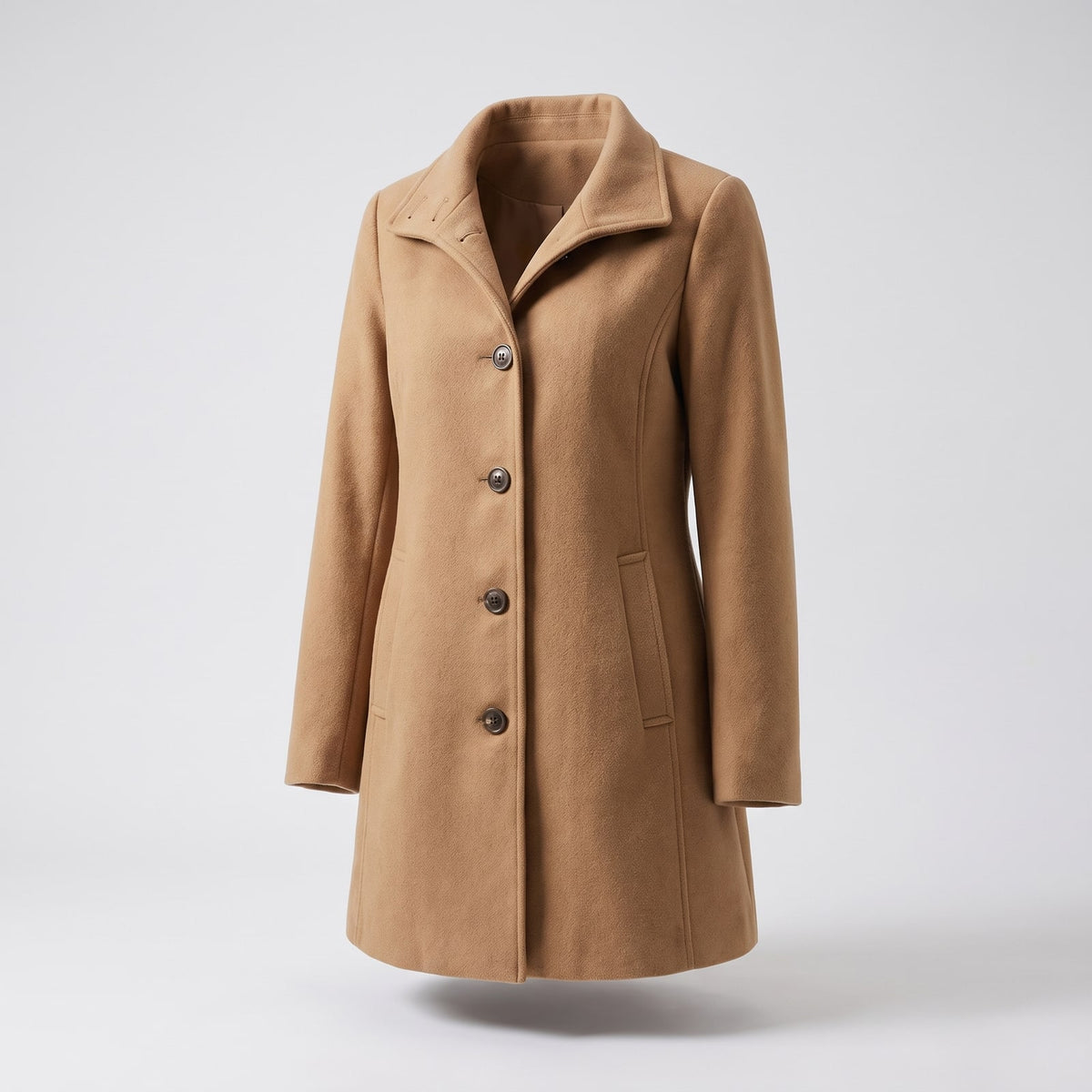 Front view of a camel-colored single-breasted wool blend coat on a ghost mannequin.