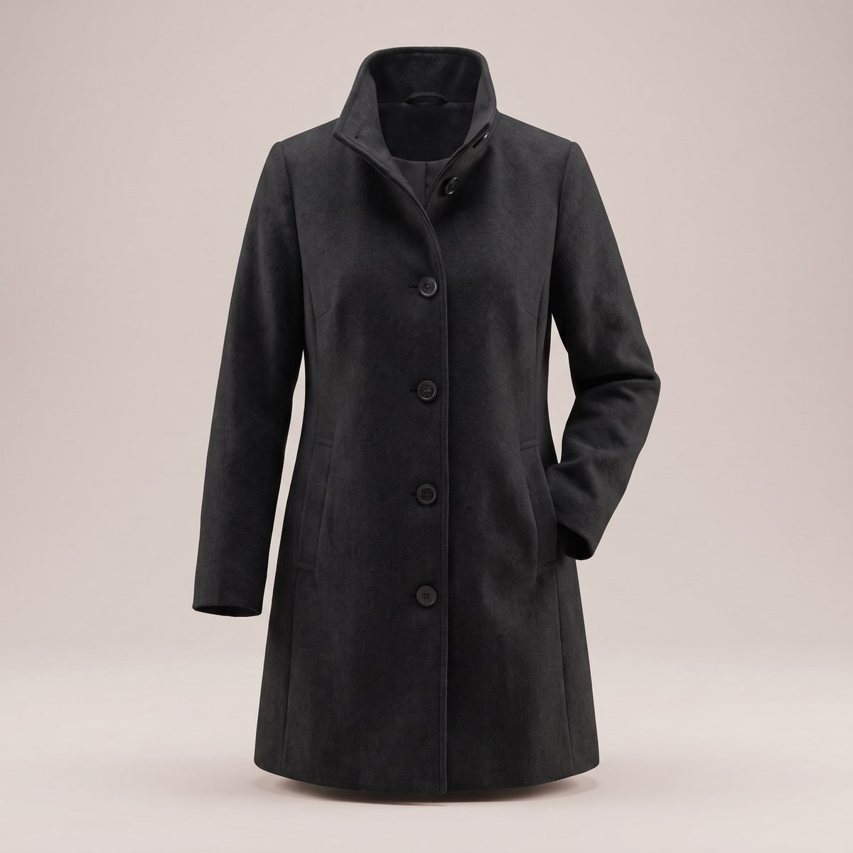Angled front view of a dark grey women's wool coat with a stand-up collar and three dark buttons.