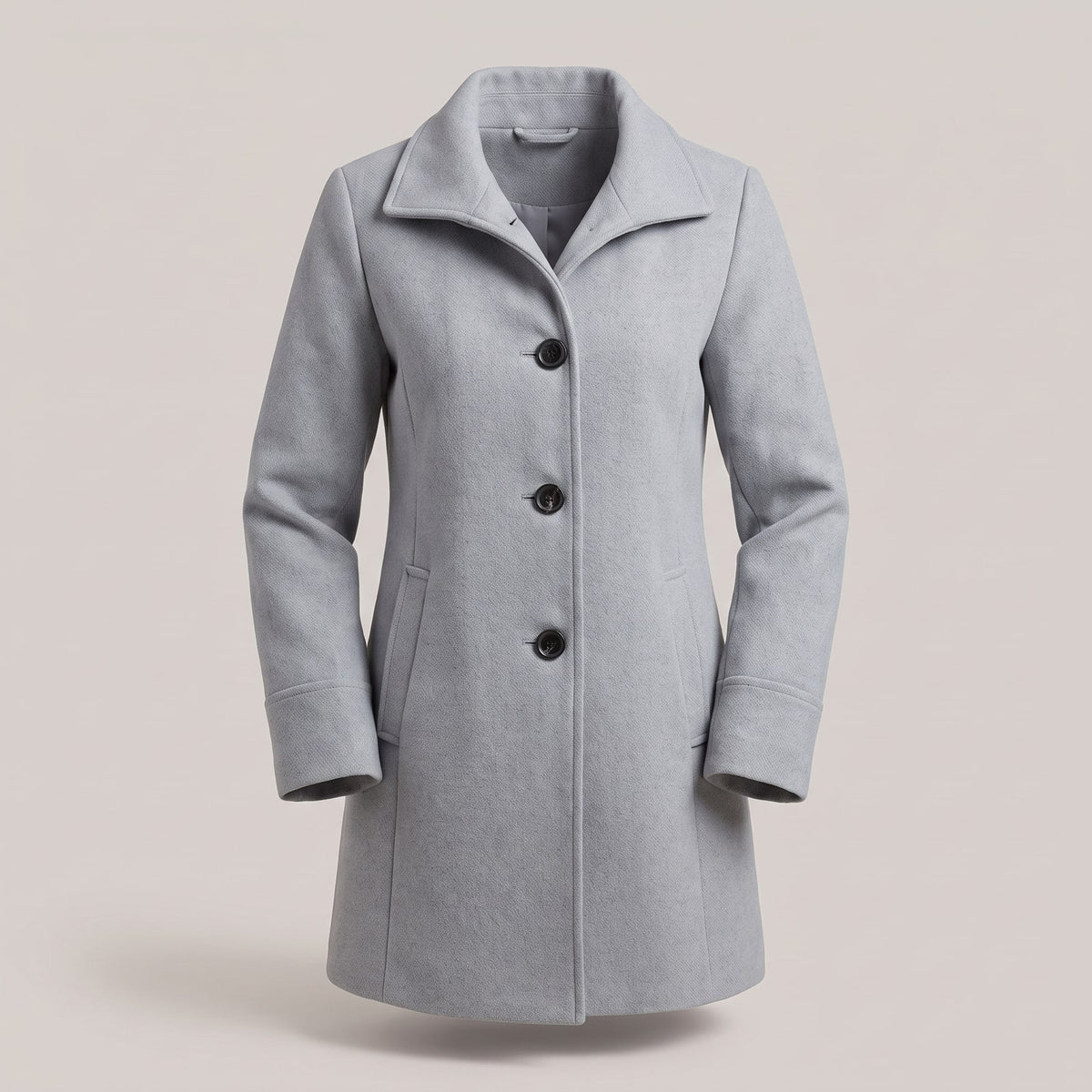 Front view of a light grey women's wool coat with a wide collar and three dark buttons.