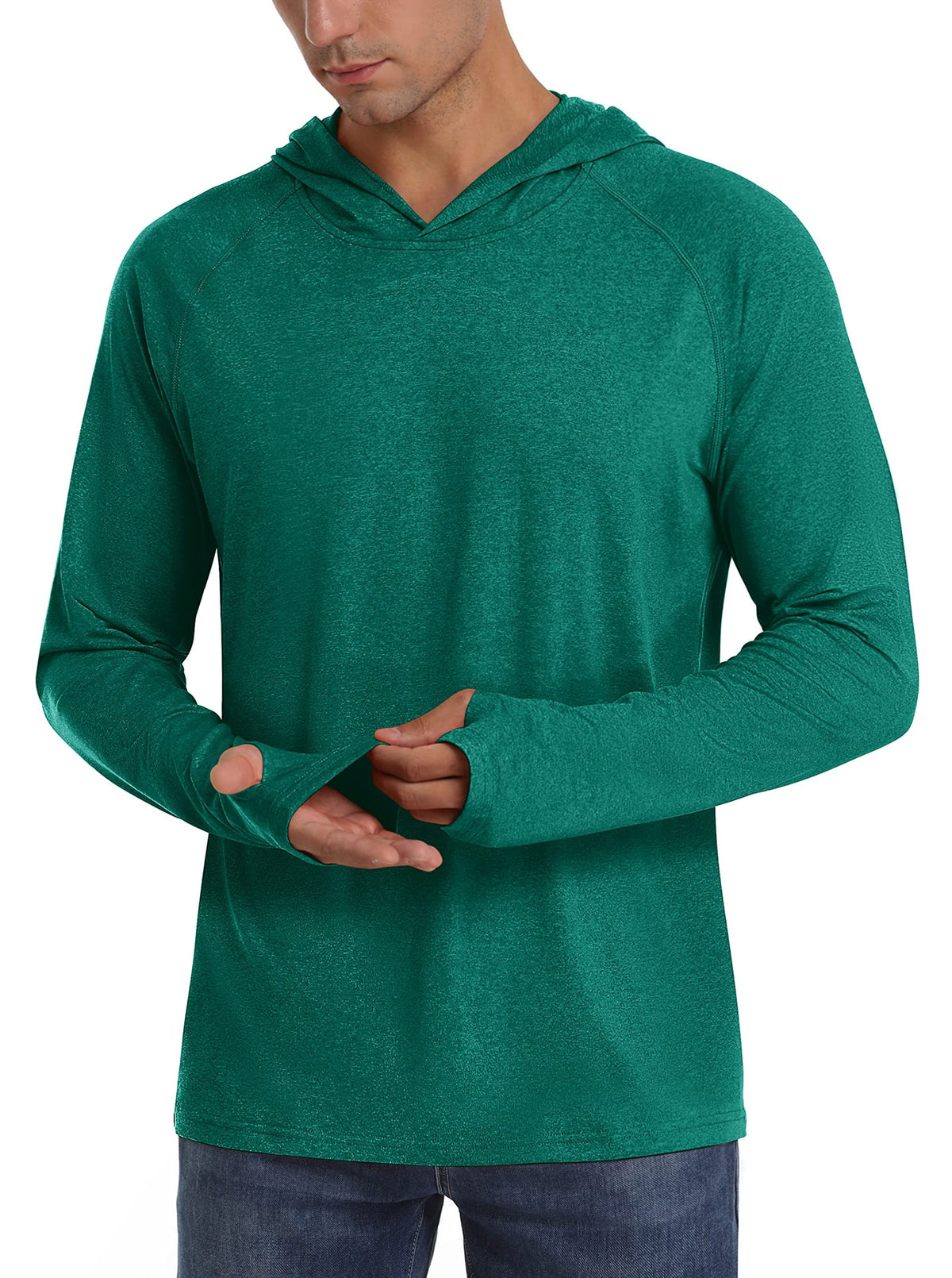 Front view of a male model wearing a green heathered long-sleeve hooded shirt, demonstrating the thumbholes.