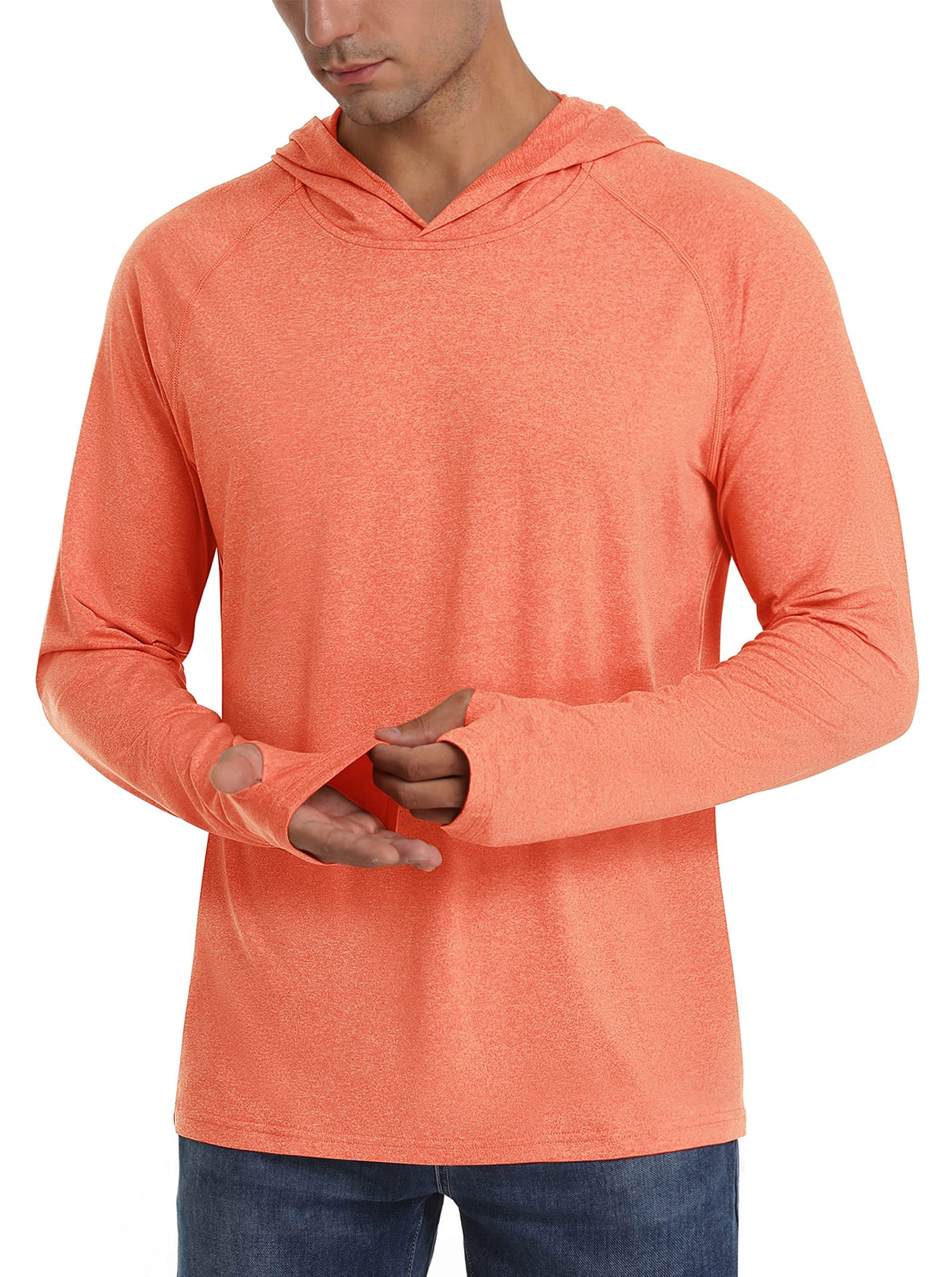 Front view of a male model wearing an orange heathered long-sleeve hooded shirt, demonstrating the thumbholes.