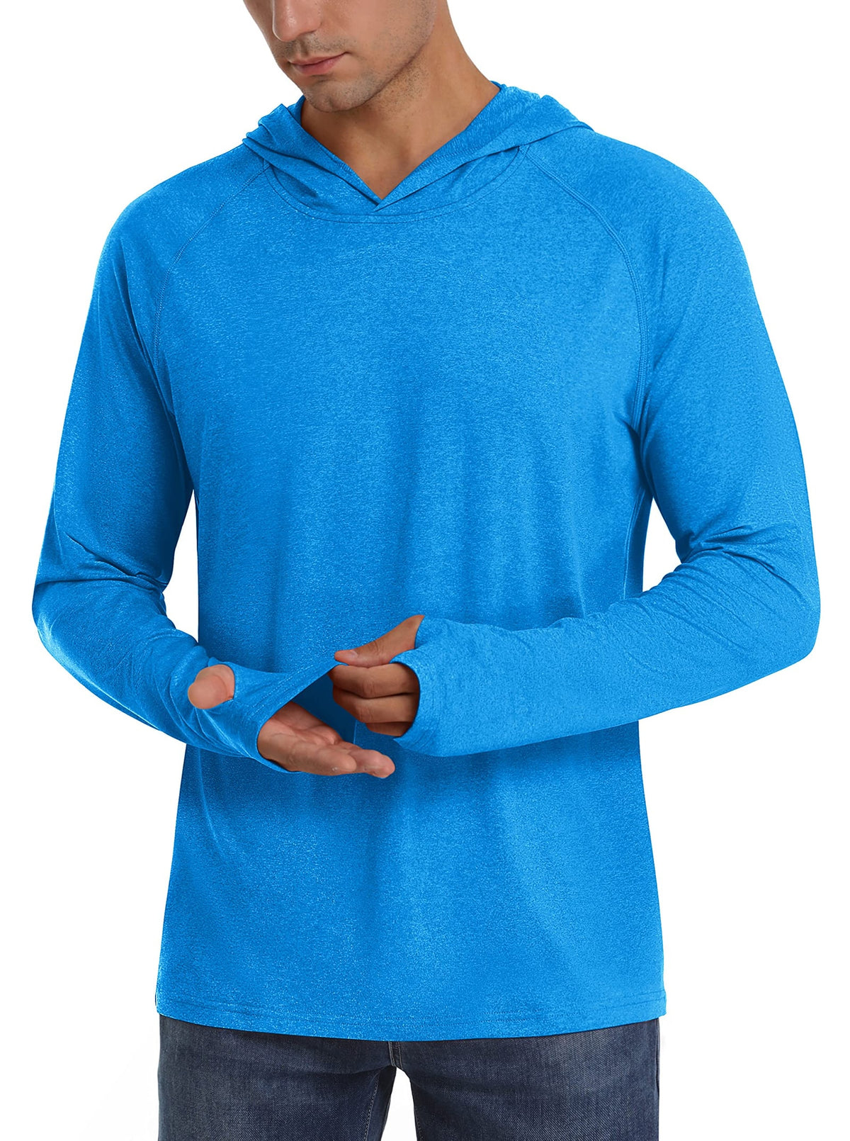 Front view of a male model wearing a bright blue heathered long-sleeve hooded shirt, demonstrating the thumbholes.