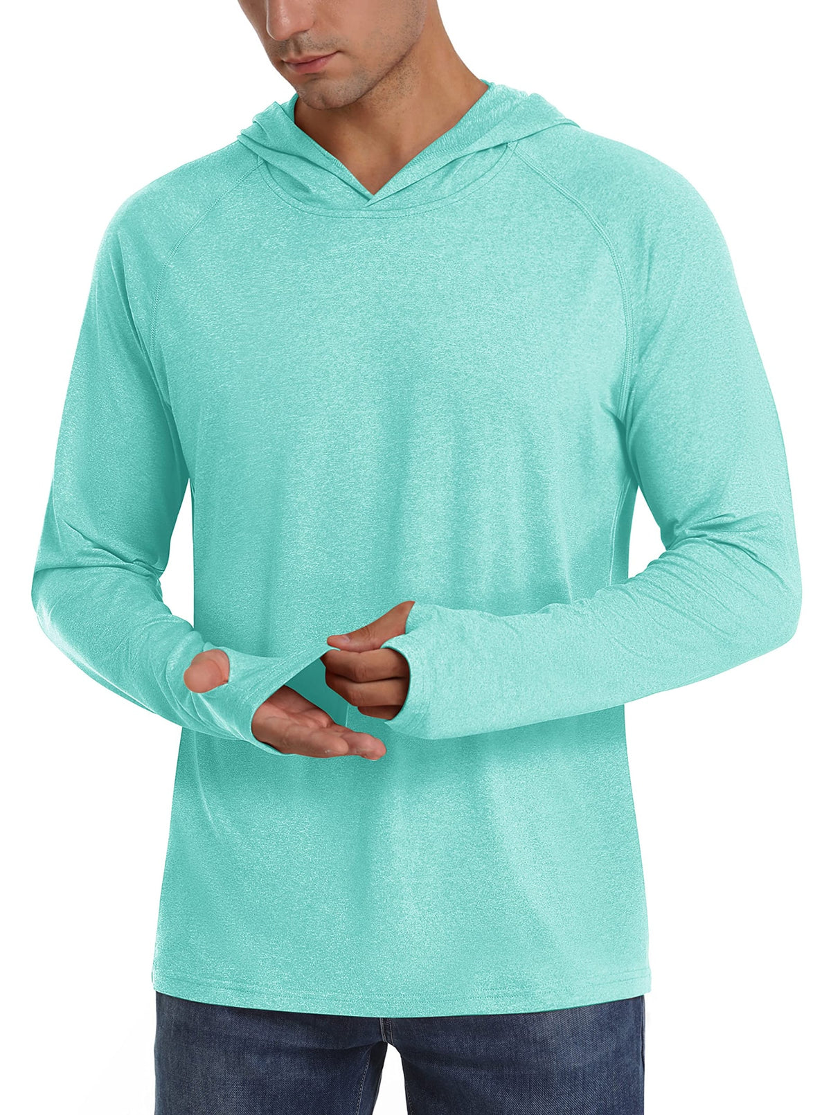 Front view of a male model wearing a mint green heathered long-sleeve hooded shirt, demonstrating the thumbholes.