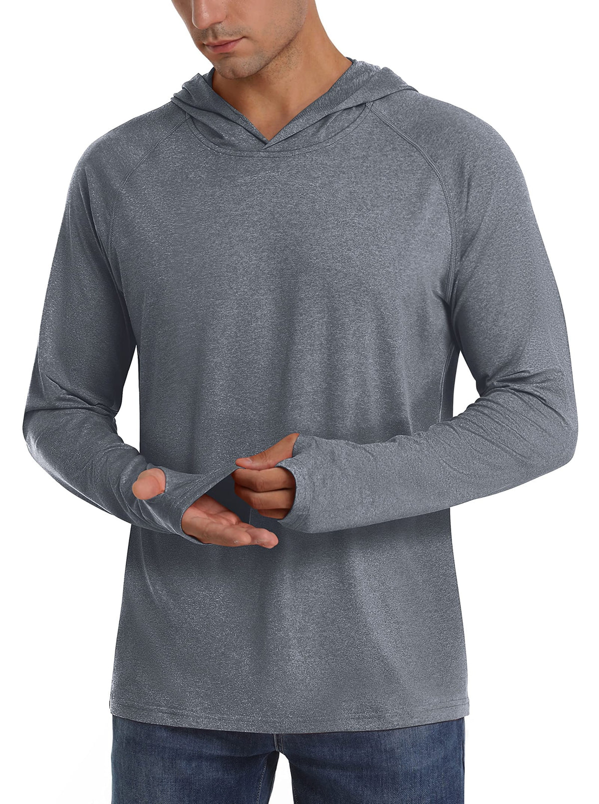 Front view of a male model wearing a grey heathered long-sleeve hooded shirt, demonstrating the thumbholes.