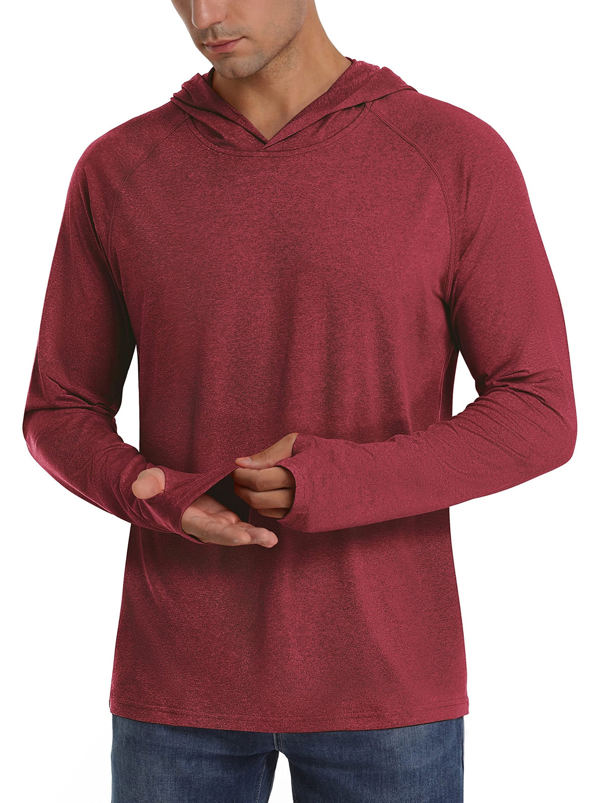 A male model wears a red long-sleeve hooded shirt with thumbholes, shown from the chest up.
