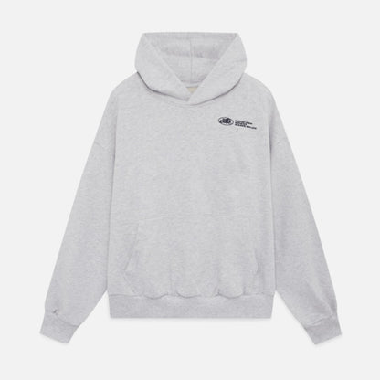 Flat lay front view of a light grey oversized hoodie with a small black chest graphic.