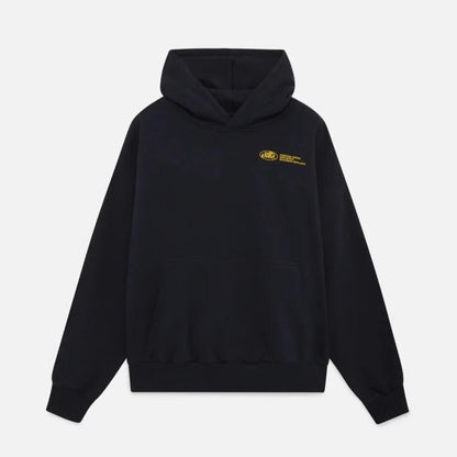 Flat lay front view of a black oversized hoodie with a small yellow chest graphic.