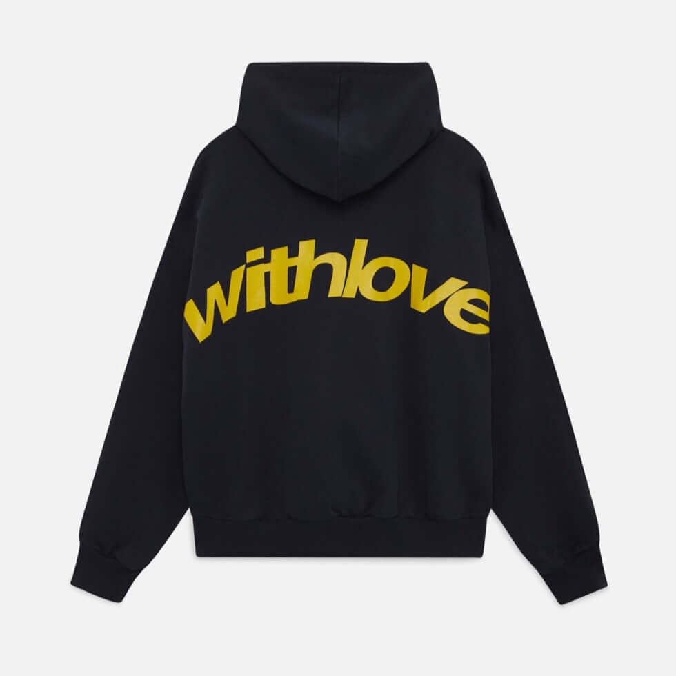 Flat lay back view of a black oversized hoodie with a large yellow 'withlove' graphic.