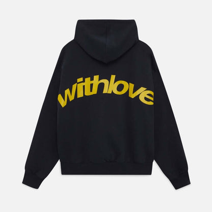 Flat lay back view of a black oversized hoodie with a large yellow 'withlove' graphic.